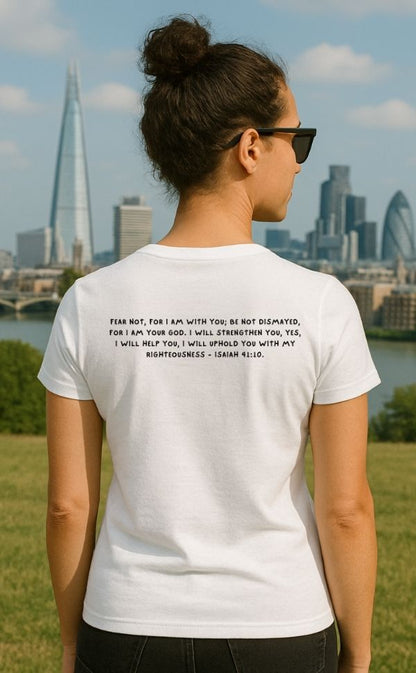 Back view of woman wearing white t-shirt from VerseWear by L’authority with Isaiah 41:10 verse – 'Fear not, for I am with you...' – Christian fashion captured with London skyline background